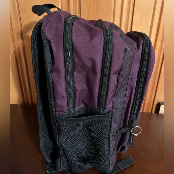 Levi’s Dark Purple Backpack with black abstract line design on the front - Picture 2 of 7
